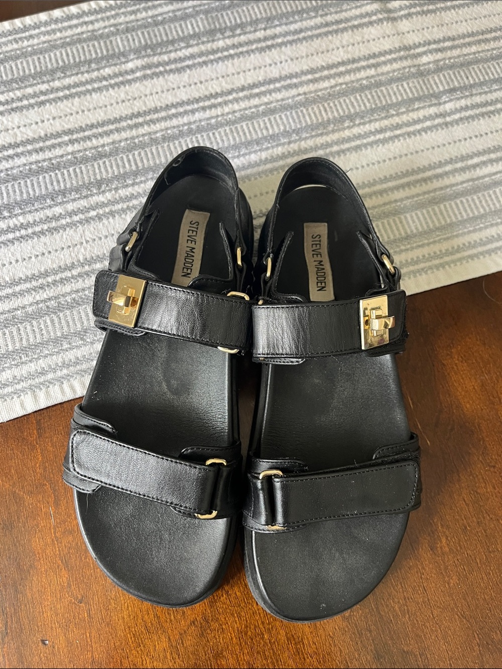 Steve Madden Black Leather Sandal with Gold Buckle Detail